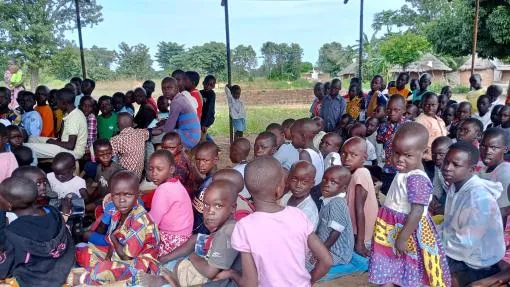 Children with school learning materials